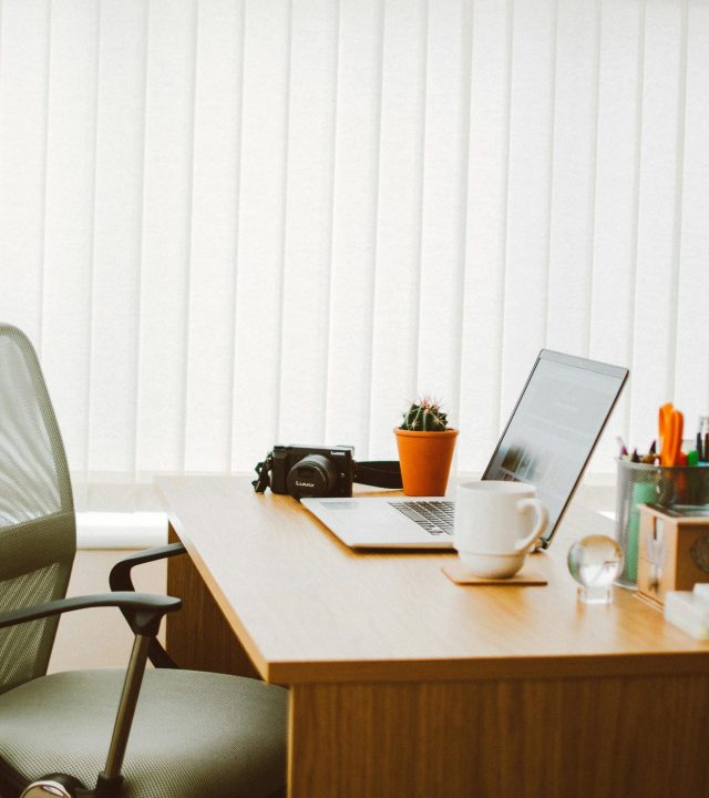 pexels-photo-2349211-2349211 A clean and bright home office setup with a laptop, chair, and desk essentials.